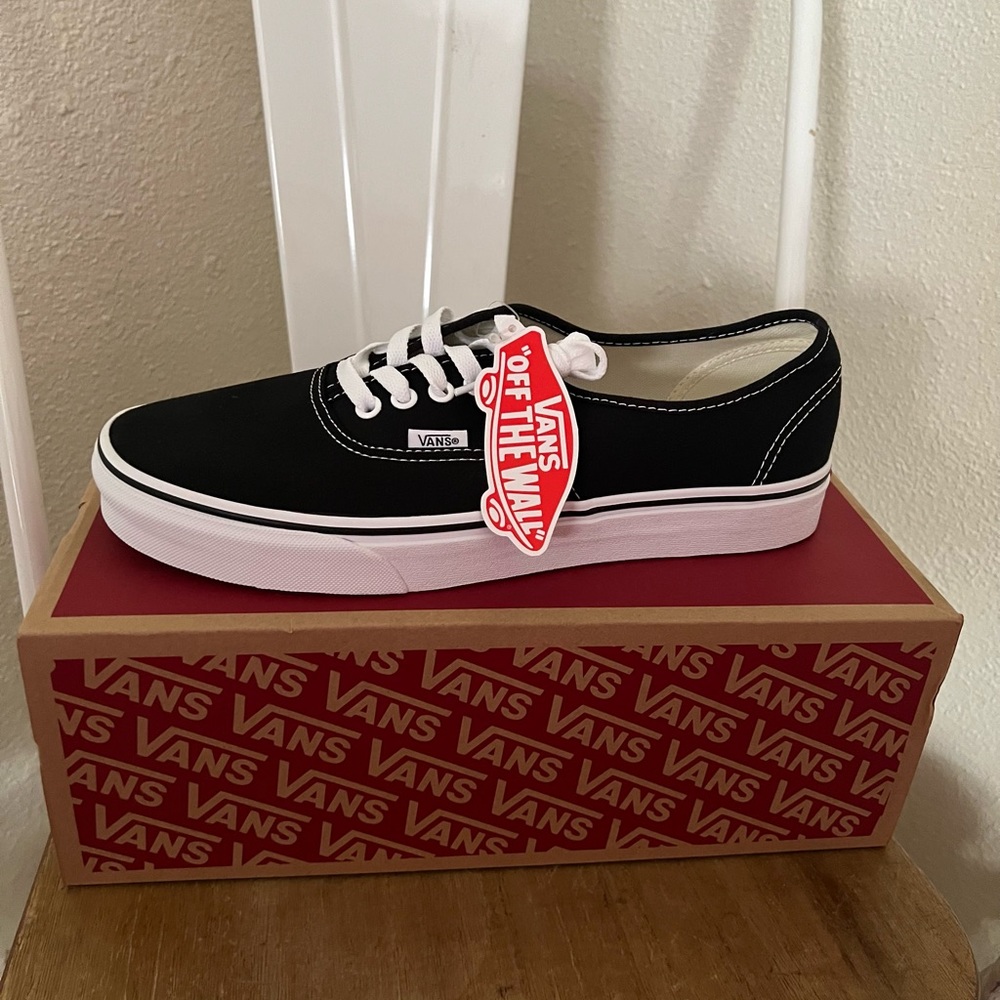 Brand new never worn Size 10.5 in men's black and white vans. Still have tag.